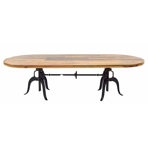 910 - Good decorative reclaimed style table, the oval reclaimed plank top on cast industrial style ratchet... 