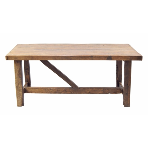 945 - Good French heavy rustic fruitwood refectory table, the cleated plank top over square supports unite... 