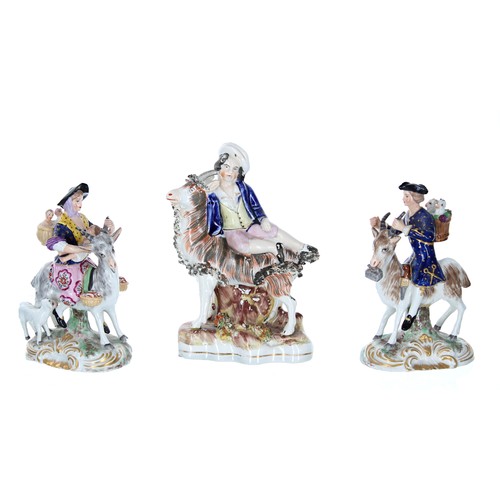 656 - Pair of Samson Derby porcelain figures of a gentleman and mother with baby riding goats, 5.75