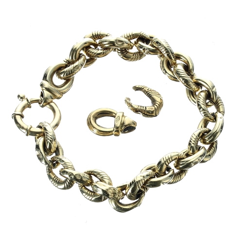 474 - 18ct bracelet and two links, 25.6gm (at fault) (217)... 