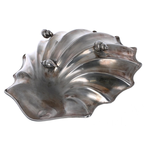 513 - Atkin Brothers silver scallop shell dish, raised on three small conch shell feet, Sheffield 1901, 10... 