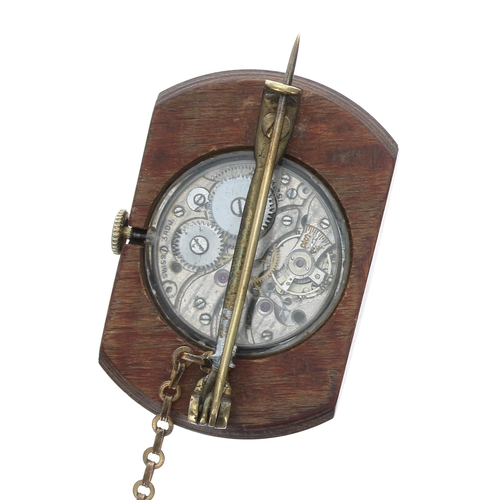 107 - Unusual 'SIRO' lapel watch in a carved wooden case, exhibition back with a Swiss 15 jewel movement, ... 