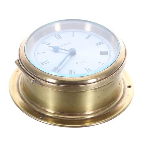 111 - Celeste British made brass bulkhead type clock, with an 8 day lever movement, 90mm diameter... 