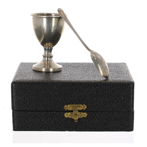 531 - F H Adams & Holman silver christening egg cup and spoon in case, inscribed 'Michael 10-2-57', Sh... 