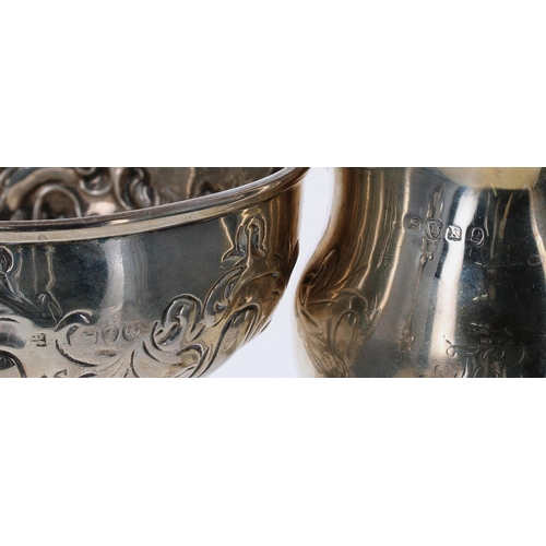 535 - Selection of silver items to include a Georgian helmet shape silver cream jug, maker indistinct, Lon... 