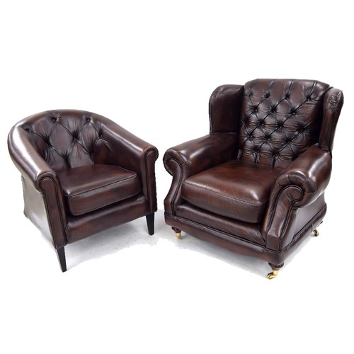 935 - Two good modern leather armchairs by Thomas LLoyd, the wing chair raised on brass castors, 37