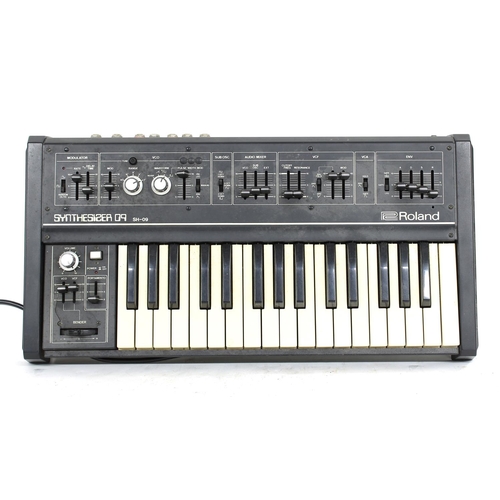 3023 - Roland SH-09 Synthesizer keyboard, made in Japan, ser. no. 107658, within a Novation gig bag... 