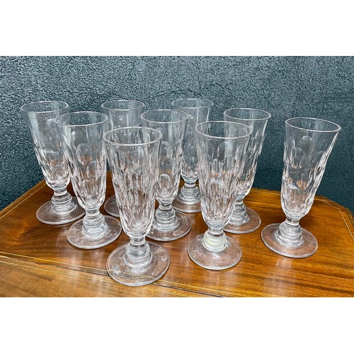 21 - A good selection of antique and later glass to include nine tall ale lens facet cut glasses, wine gl... 