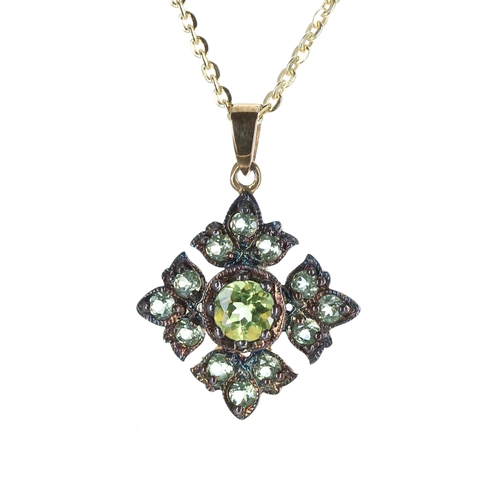 30 - Peridot set pendant in the Victorina manner, on a silver-gilt chain, the pendant 23mm, 3.4gm... 