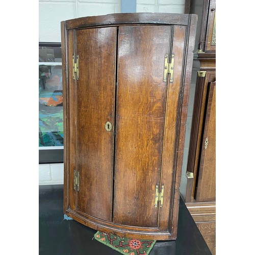 84 - 19th century oak bow fronted hanging corner cupboard, 23