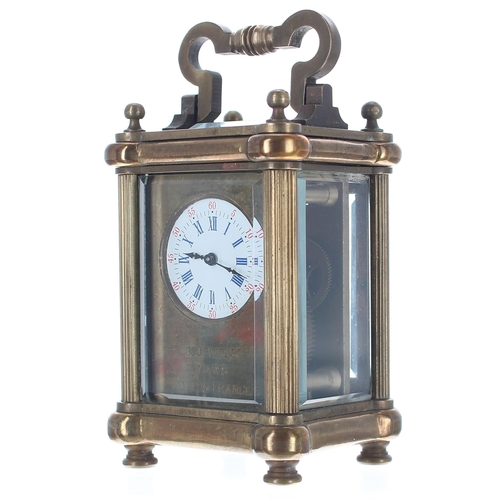 1305 - Miniature carriage clock timepiece, the enamel dial with Roman and Arabic numerals within a brass ma... 