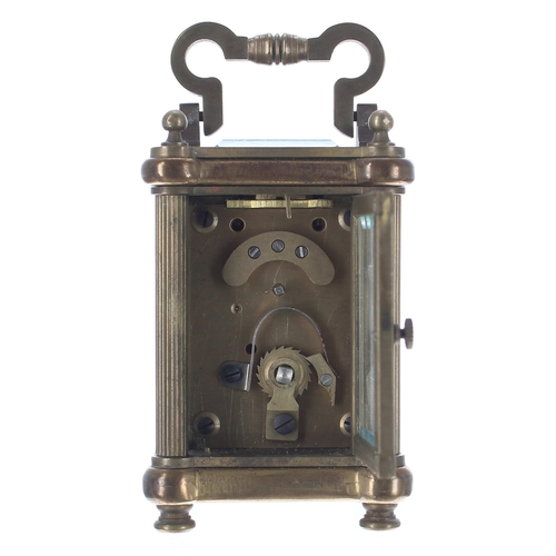 1305 - Miniature carriage clock timepiece, the enamel dial with Roman and Arabic numerals within a brass ma... 