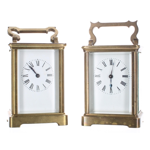 1314 - Two similar carriage clock timepieces within corniche brass cases, both 5.75