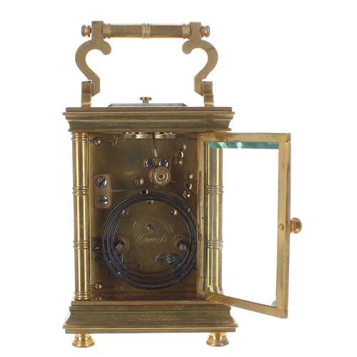 1318 - Small repeater carriage clock striking on a gong, stamped France to the base, the white enamel dial ... 