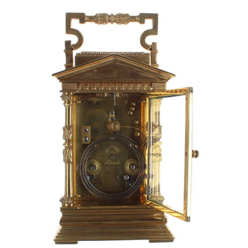 1323 - Large French ornate repeater carriage clock striking on a gong, the movement back plate stamped no. ... 