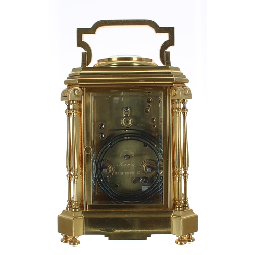 1333 - Good French gilded brass repeating carriage clock striking on a gong, the black painted porcelain di... 