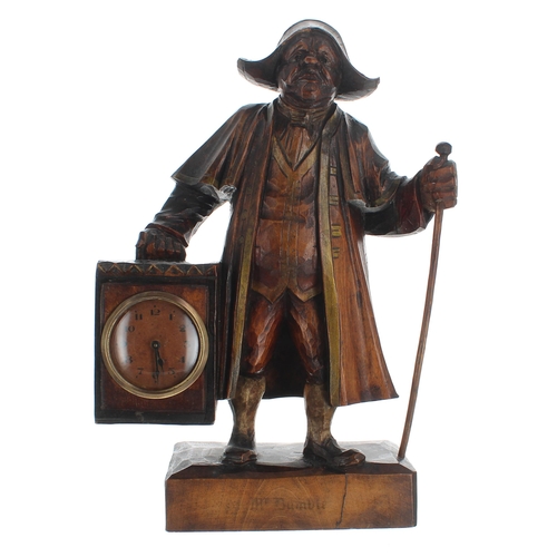 1363 - Novelty Black Forest clock carved as a standing wooden figure entitled Mr Bumble, depicted in tradit... 