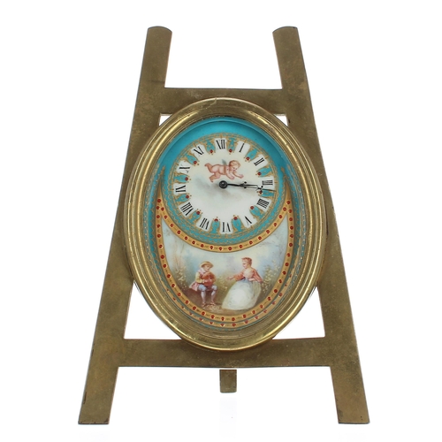 1371 - Attractive French porcelain and brass miniature easel clock timepiece, the oval porcelain dial plate... 