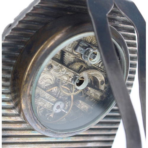 1372 - Continental silver strut clock timepiece, the small chapter ring within a foliate engraved surround ... 