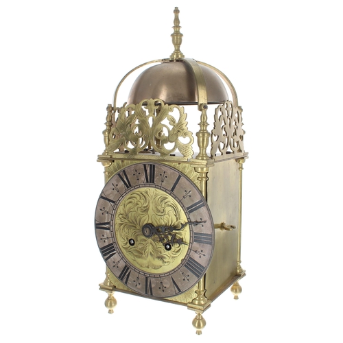 1375 - Brass lantern clock, the eight day ting-tang quarter strike on two bells and the movement back plate... 