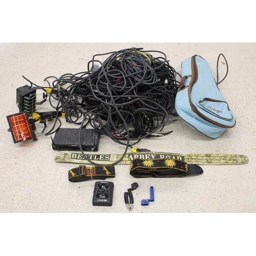 1134 - Selection of guitar and other related items to include an Abbey Road guitar strap, a Fender guitar s... 