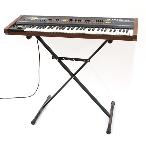 3100 - 1980s Roland Juno 6 Polyphonic Synthesizer keyboard, made in Japan, ser. no. 21587O, with stand (in ... 