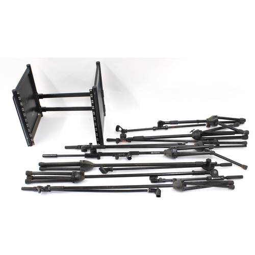 3103 - Seven boom arm microphone stands; together with a rack unit frame