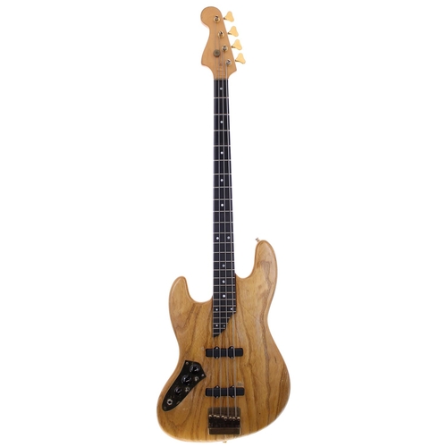 127 - Custom built J Bass left-handed bass guitar comprising a DiMarzio branded natural finished body, an ... 