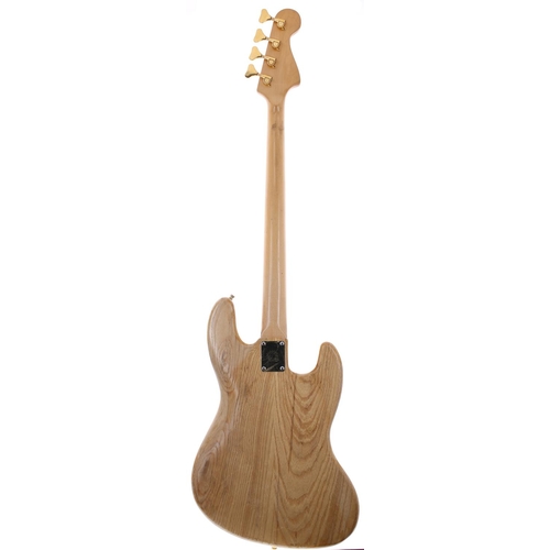 127 - Custom built J Bass left-handed bass guitar comprising a DiMarzio branded natural finished body, an ... 