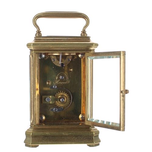 1306 - Tiffany of London miniature brass carriage clock timepiece with eight day movement, the white enamel... 