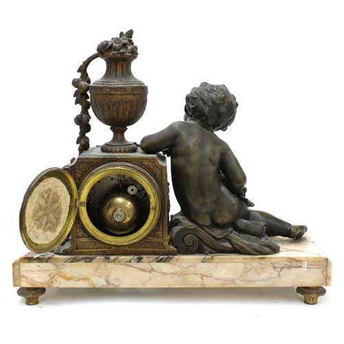 2312 - French bronzed and coloured marble two train figural mantel clock, the later movement striking on a ... 