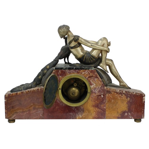 2313 - French Art Deco red and black marble two train mantel clock garniture striking on a bell, the octago... 