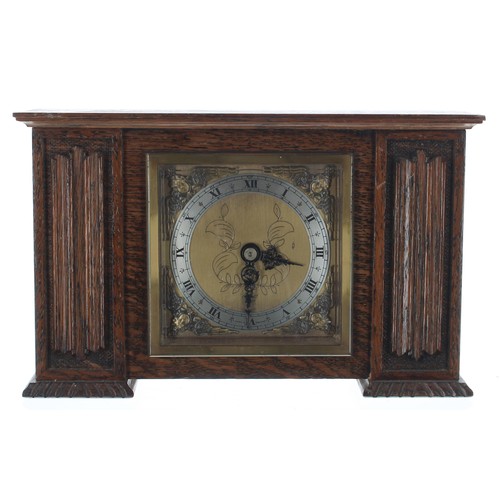 2519 - Elliott of London Jacobean style small mantel clock timepiece, within a solid carved oak case, 5.75