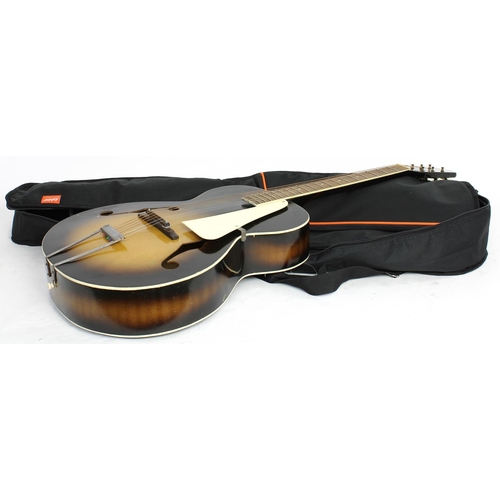 429 - 1940s Silvertone archtop guitar; Body: tobacco sunburst finish, scratches and dings throughout, some... 