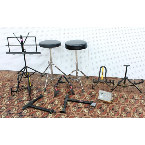 1157 - Selection of stands to include two Hercules guitar stands, one Fender guitar stand, a B&W guitar... 