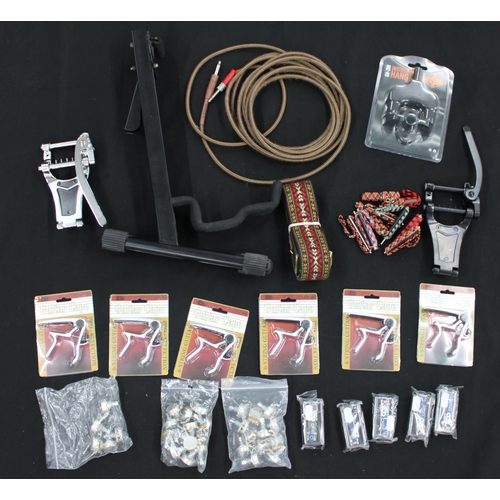 1161 - Selection of guitar spares to include two Bigsby style guitar tailpieces, a vintage style strap, var... 