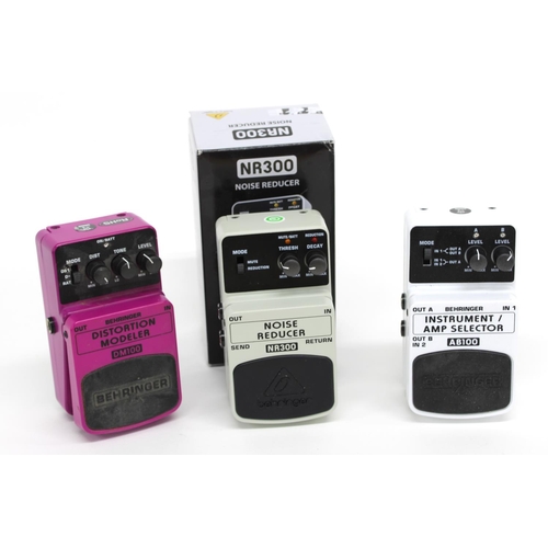 895 - Three Behringer guitar pedals to include an NR300 Noise Reducer, an AB100 Instrument/Amp Selector an... 