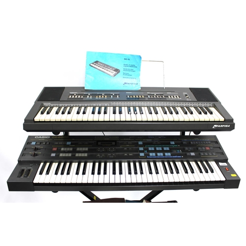 3132 - Casio CZ-5000 synthesizer keyboard, made in Japan, ser. no. 605446, with cover and manuals; together... 