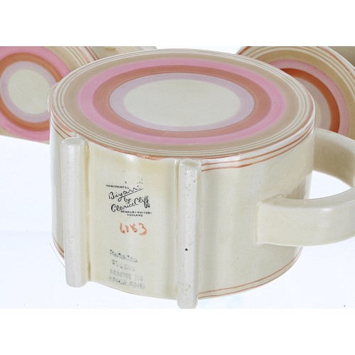 565 - Clarice Cliff Bizarre Bonjour three piece tea set, painted with circular bands in pink and light bro... 