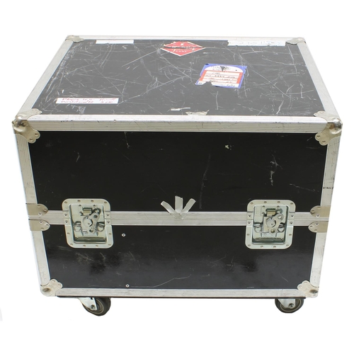 602 - Gary Moore - heavy duty flight case on wheels, bearing various tape annotations and airline freight ... 