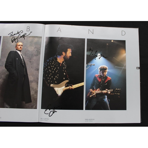 663 - Eric Clapton and others - 1998 25th Anniversary tour programme autographed by various artists to inc... 