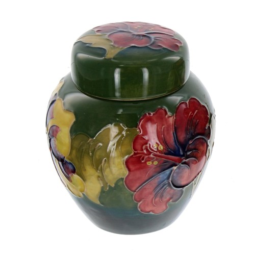 613 - Moorcroft Pottery 'Hibiscus' ginger jar and cover, stamped factory marks and applied factor label to... 