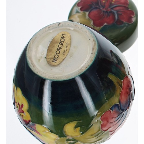 613 - Moorcroft Pottery 'Hibiscus' ginger jar and cover, stamped factory marks and applied factor label to... 