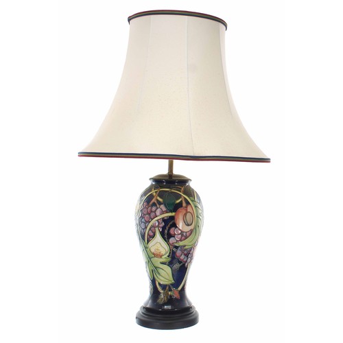 572 - Moorcroft Pottery 'Queens Choice' table lamp, an Emma Bossons design, mounted upon a turned base lab... 