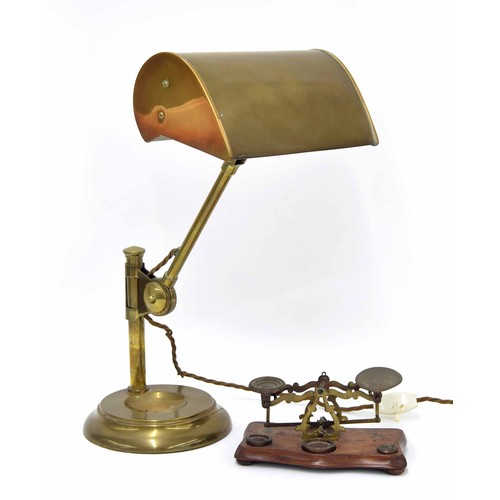 648 - Vintage brass bankers lamp, height adjustable on a circular weighted desk stand, 16.5