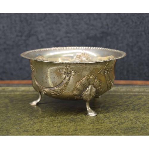 683 - Edward VII silver bowl, repousse decorated with swags with a reeded rim, raised on three s... 