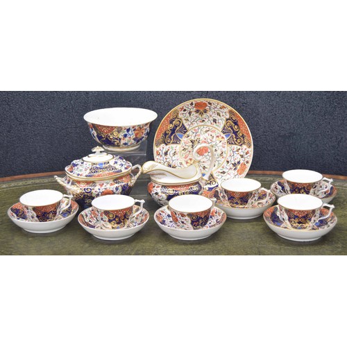 714 - 19th century Derby porcelain part tea set, comprising six cups with saucers, sucrier with cover (cov... 