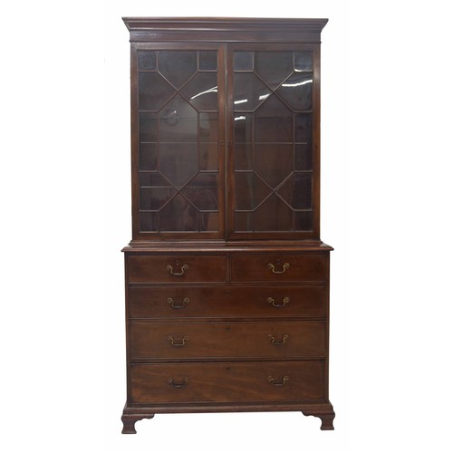 854 - Georgian mahogany library bookcase, with a stepped cornice over astragal glazed doors enclosing a sh... 