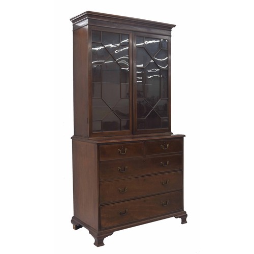 854 - Georgian mahogany library bookcase, with a stepped cornice over astragal glazed doors enclosing a sh... 