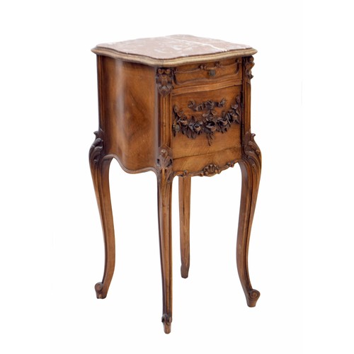 887 - French bedside pot cupboard, the serpentine  rouge marble top over a single drawer and carved applie... 